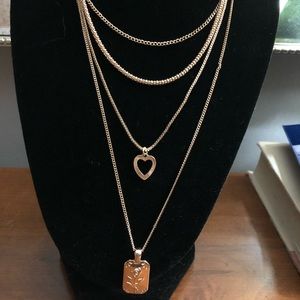 Four strand rose pendant necklace